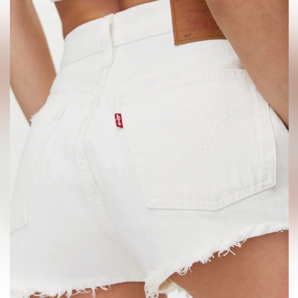 Levi’s | 501 button fly raw hem cut off high rise denim shorts white siz…